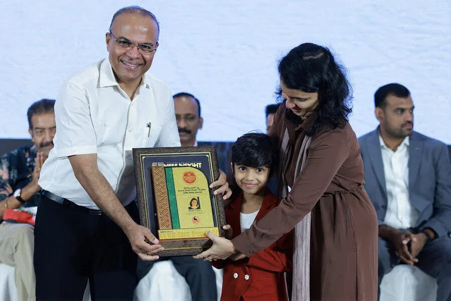 Risha Sheikh receiving recognition at the Best of Kerala Business Awards 2025