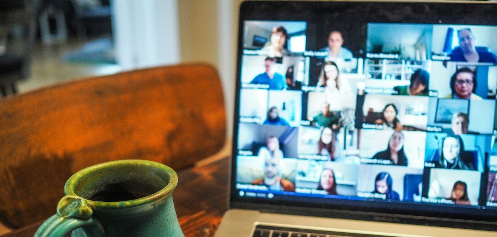macbook pro displaying group of people